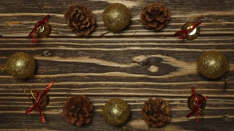 Stop motion animation. Round frame made of Christmas toys on a wooden backgro Stock Footage 143003613