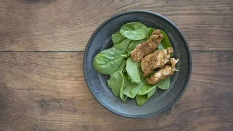 Stop Motion Animation of a Southwest Chicken Salad being Built Stock Footage 140656068