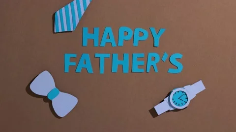 Stop motion animation with text happy father's day on brown background. Vídeo Stock 239742385