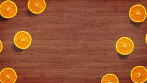 Stop motion animation top view on oranges rotating over a wood table Stock Footage 135843379