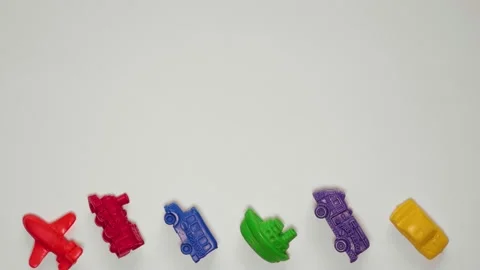 Stop motion animation of toy plastic vehicles for the titles. Stock Footage 131171105