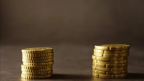 A stop motion animation of two stacks of euro coin that grow together Stock Footage 160550257