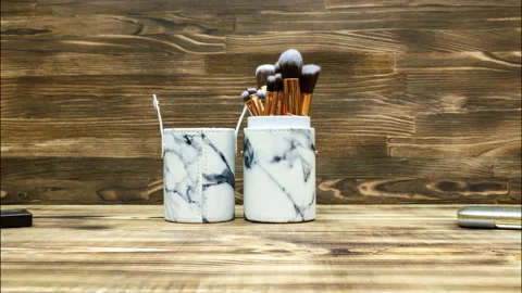 Stop motion animation Various Makeup brushes full set, eyeshadow and powder Stock Footage 278732378
