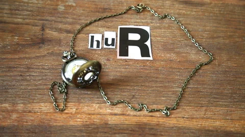 Stop motion animation of a vintage clock and the sentence "hurry up" Stock-Footage 56696398