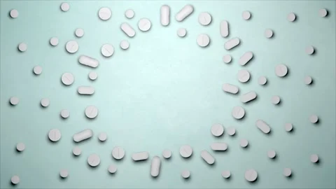 Stop motion animation white pills on a blue background, top view. Medical drugs  Stock Footage 170517659