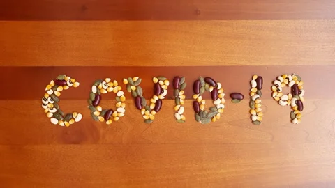 Stop motion animation of the word "Covid-19". Video stock 162910372