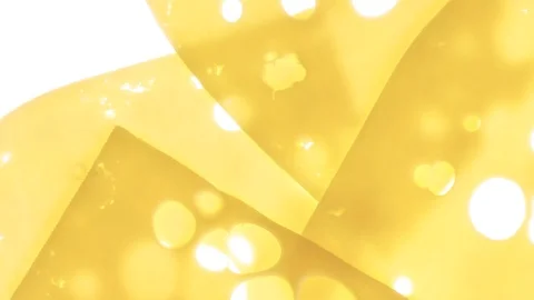 Stop motion appear and disappear slices of cheese on white Stock Footage 108311965