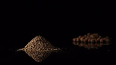 STOP MOTION: Black pepper powder appearing on mirror surface Stock Footage 108417427