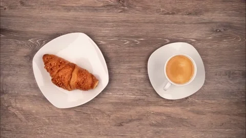 Stop motion from breakfast with a croissant and a coffee Stock Footage 138078452