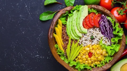 Stop motion. Buddha Bowl. Concept for a tasty and healthy vegetarian meal. Stock Footage 127265897