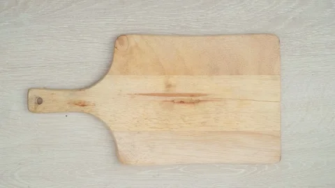 Stop motion carrots. Slicing a vegetable in the kitchen 库存影片 124536379