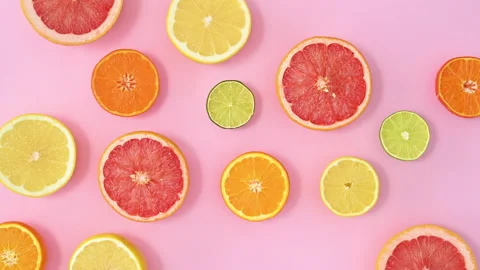 Stop motion citrus fruits pattern. half sliced fruits ordering and make frame Video stock 169328767