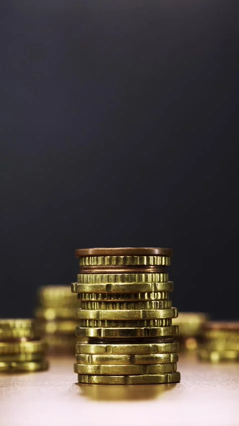 Stop-Motion Coin Stack Shrinks to Zero, Signifying Savings Loss Stock Footage 314243417