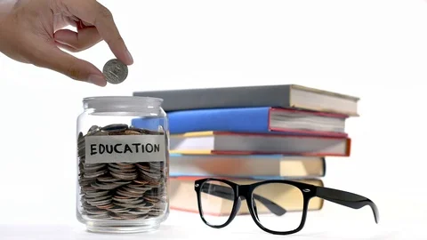 Stop motion concept of saving money for education Stock Footage 126420678