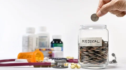 Stop motion concept of saving money for medical . Stock Footage 126420706