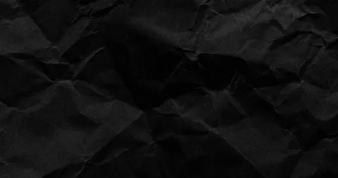 Stop-Motion Crumpled Black Paper Texture. Video stock 334714792