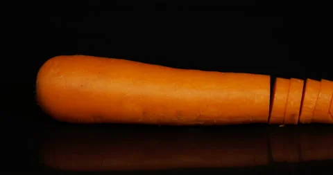 Stop motion cutting carrot close up Stock Footage 98255639