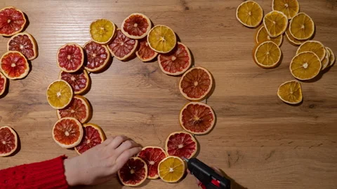 STOP MOTION DIY process of woman making Christmas wreath arrangement with dried Video stock 282698349