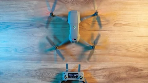Stop motion of a drone unfolding itself on a tabletop 動画素材 240018781