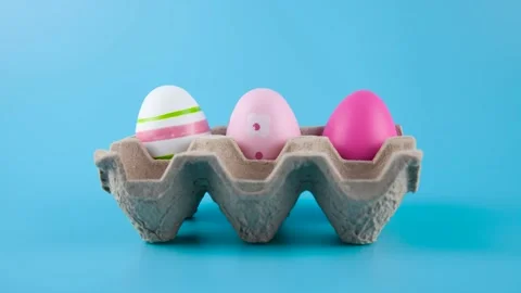 Stop motion. Easter eggs in the form of a rabbit in a cardboard box Stock Footage 171711037