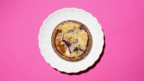 Stop motion eating fruit cheesecake bite by bite. Plate of cake moving Видео 145270519