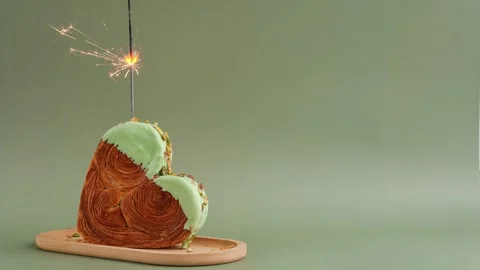 Stop motion of Festive holiday candle birthday anniversary celebration Heart Stock Footage 319428508