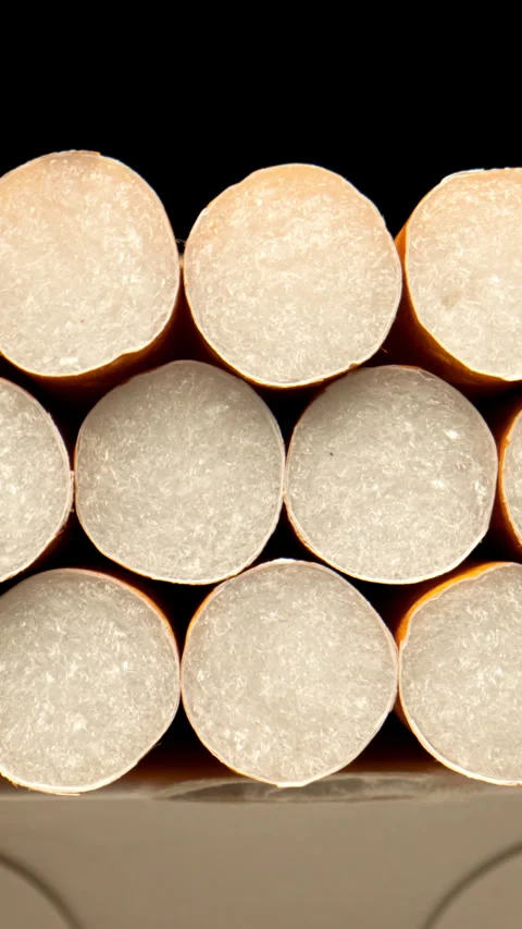 STOP MOTION: Filter cigarettes are gradually disappearing from the pack Stock Footage 344860370