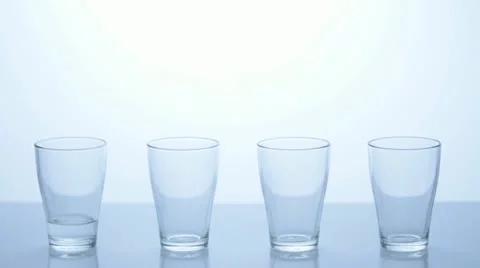 Stop Motion - Four Water Glasses - Part 1 Stock Footage 11606384