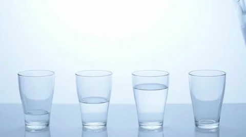 Stop Motion - Four Water Glasses - Part 4 Stock Footage 11606393