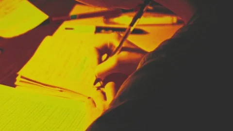Stop motion with glitched vibrant colors. Teenager girl studying her homework. Stock Footage 86436748