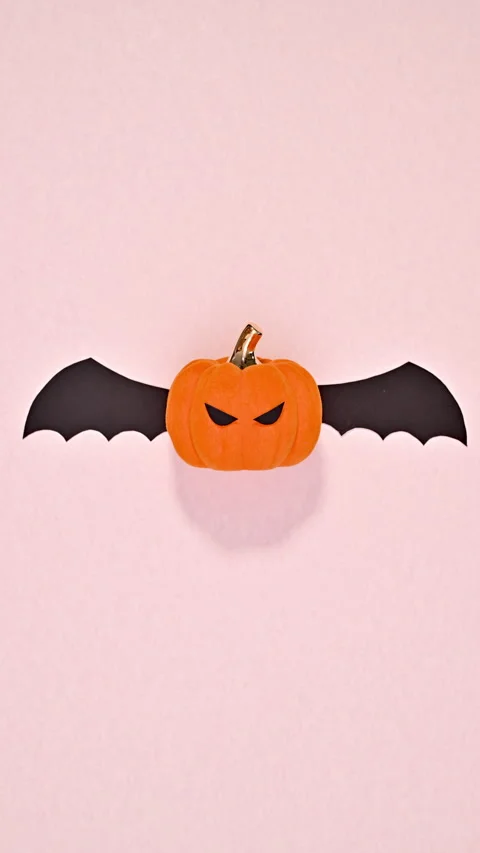 Stop motion Halloween pumpkin with wings and creepy face. Vertical Stock Footage 283266013