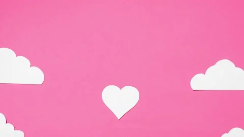 Stop motion Happy Valentine's Day. Heart and clouds move up Stock Footage 145270571