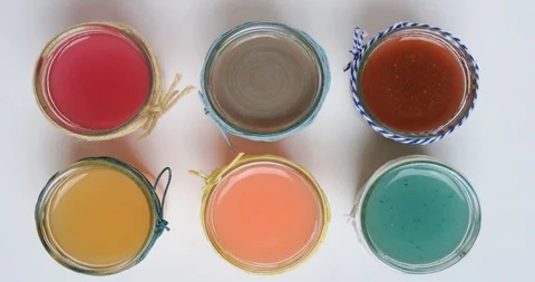 Stop motion of jars with paints Stock Footage 93755846