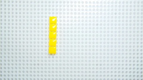 Stop motion of the letter U creating one pixel at the time, made with Vídeo Stock 101735896