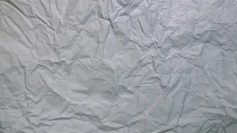  Stop motion looping animation of white crumpled paper texture background. Stock Footage