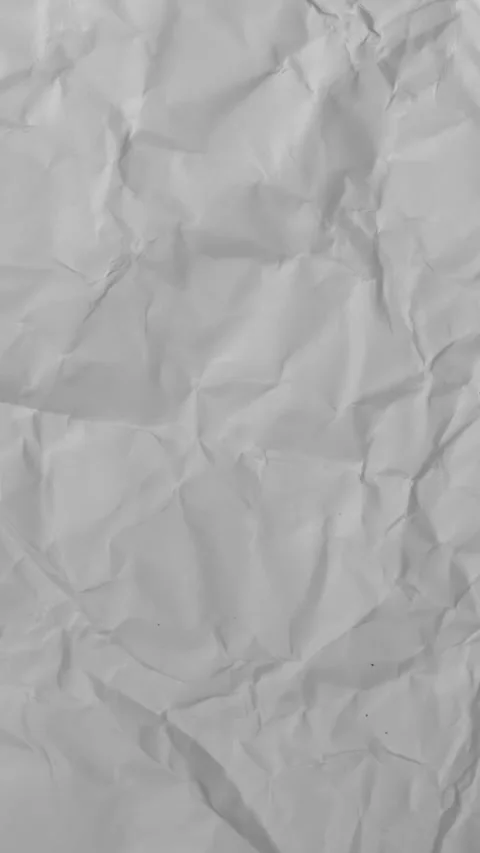 Stop motion looping animation of white crumpled paper Stock Footage 297357093