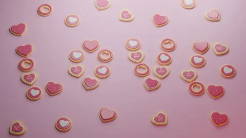 Stop motion “Love” sign making with Valentine’s Day heart shaped cookies Видео 168839901