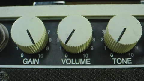 Stop motion macro shot of guitar amp knobs changing settings 스톡 동영상 130596124