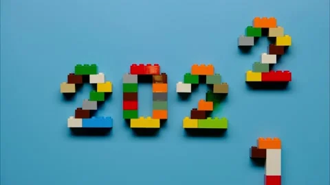 Stop motion of making symbol 2022 from colorful constructor Stock Footage 167143516