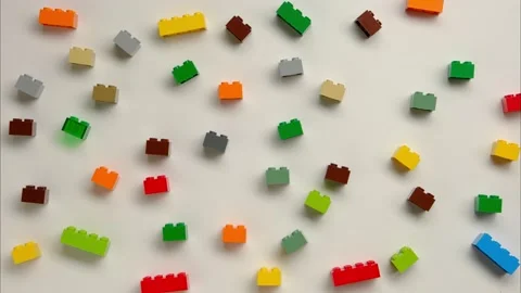 Stop motion of making symbol 2022 from colorful constructor blocks Stock Footage 167927159