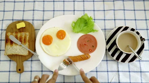 Stop motion of man hands eating breakfast in the morning Stock Footage 50357229