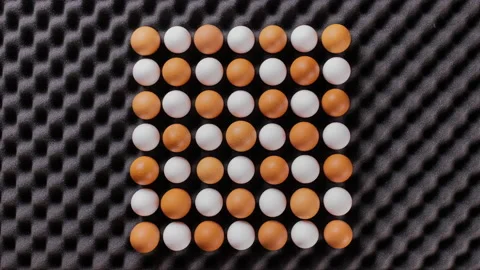 Stop motion of many brown and white eggs wiggling - creative food, copy space Stock-Footage 172111223