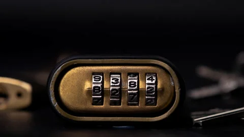 Stop motion of metal combination code lock with number rolling looping.  Stock Footage 261007512