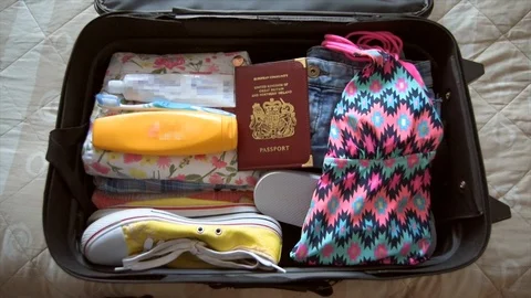 Stop Motion of Packing Suitcase Cinemagraph Stock Footage 102839337