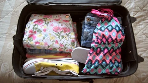 Stop Motion of Packing A Suitcase Cinemagraph Stock Footage 102839348