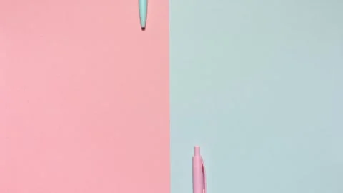 Stop Motion Pastel Notebooks And Pens On Pink And Blue Split Video stock 315085229