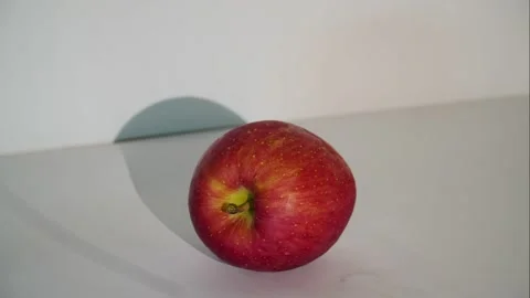 Stop motion peel apple then bite and eating apple Stock Footage 133622319