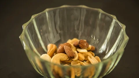 Stop motion picture of mixed nuts , in studio Chiangmai Thailand Stock Footage 104540848