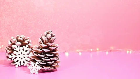 Stop Motion of Pine Cones and Snowflakes Amidst Glitter Background Stock Footage 255374793
