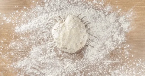 Stop motion of pizza preparation on a floured table Stock Footage 127371354